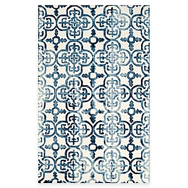 Safavieh Dip Dye Clover 5-Foot x 8-Foot Area Rug in Ivory/Navy. View a larger version of this product image.