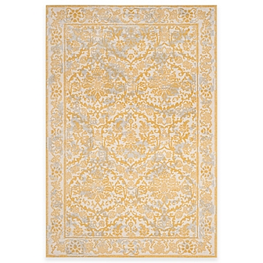 Safavieh Evoke Collection Jade 5-Foot 1-Inch x 7-Foot 6-Inch Area Rug in Ivory/Gold. View a larger version of this product image.