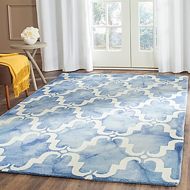 Safavieh Dip Dye Trellis Curve 2-Foot x 3-Foot Accent Rug in Blue/Ivory. View a larger version of this product image.