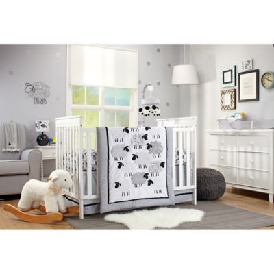 crib mattress with sheep on it