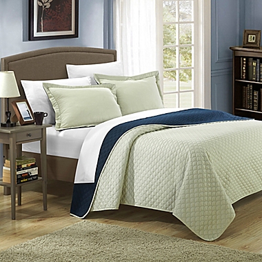 Chic Home Lugano 7-Piece Reversible Queen Quilt Set in Navy. View a larger version of this product image.