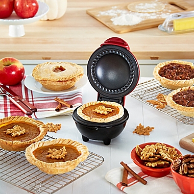 Dash&reg; Mini Pie Maker in Red. View a larger version of this product image.