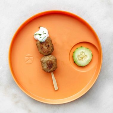 Kizingo Nudge Plate in Dark Blue/Orange (Set of 2). View a larger version of this product image.