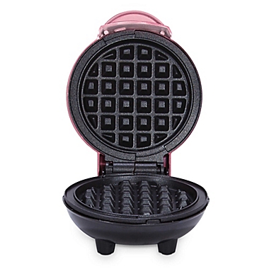 Dash&reg; Mini Waffle Maker in Pink. View a larger version of this product image.