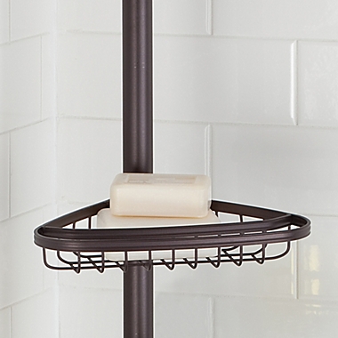 iDesign&reg; York Tension Corner Shower Caddy in Bronze. View a larger version of this product image.