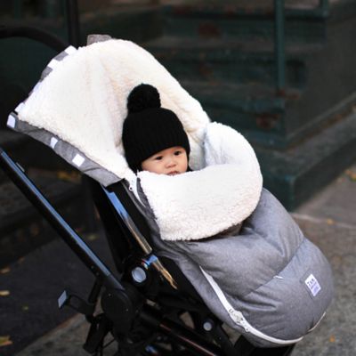 100%  lamb's-wool footmuff f;   baby excellent warm for stroller cosy!! 