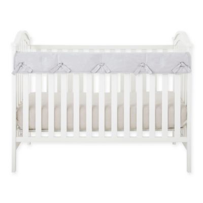 crib with adjustable rail