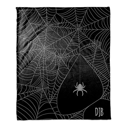 Alternate image 1 for Halloween Spider Webs Throw Blanket in Purple/Black