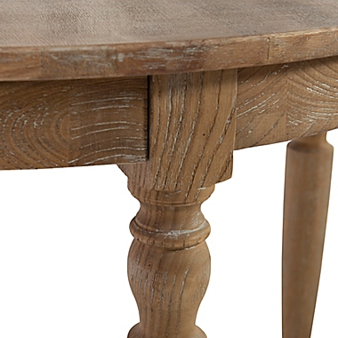 Shiraz Round Dining Table in Natural. View a larger version of this product image.