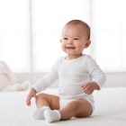 Alternate image 4 for Gerber ONESIES&reg; Brand Size 12M 3-Pack Long Sleeve Bodysuits in White