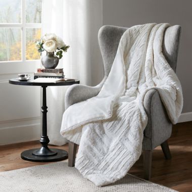 Madison Park Arctic Plush Down Alternative Throw Blanket in Ivory. View a larger version of this product image.