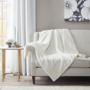 Madison Park Arctic Plush Down Alternative Throw Blanket in Ivory. View a larger version of this product image.