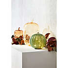 Alternate image 1 for Bee &amp; Willow&trade; Glass LED-Lit Pumpkin Decoration in Amber