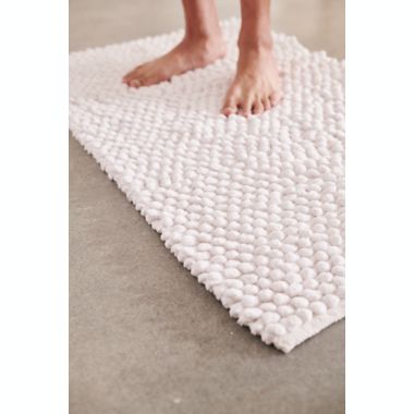 Haven&trade; Pebble 21" x 34" Bath Rug in Coconut Milk. View a larger version of this product image.