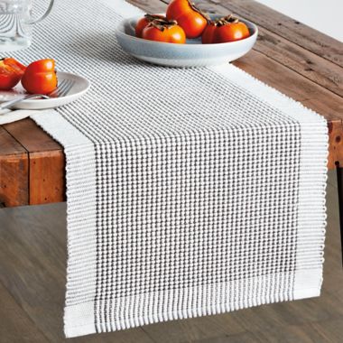 Bee &amp; Willow&trade; Bordered 72-Inch Table Runner in Granite Grey. View a larger version of this product image.