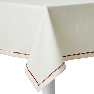 Bee &amp; Willow&trade; Embroidered Snowflake 60-Inch x 144-Inch Oblong Tablecloth. View a larger version of this product image.