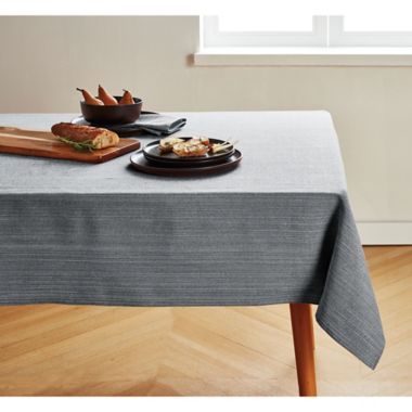 Our Table&trade; Textured 60-Inch x 84-Inch Oblong Tablecloth in Navy. View a larger version of this product image.