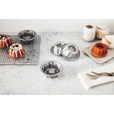 Our Table&trade; Non-Stick Mini Flute Pans in Silver (Set of 4). View a larger version of this product image.