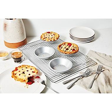 Our Table&trade; Non-Stick Mini Pie Dishes in Silver (Set of 4). View a larger version of this product image.