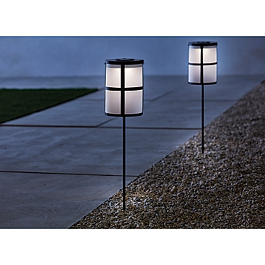 Studio 3B&trade; Solar Cage Lantern Outdoor Stake Light in Matte Black. View a larger version of this product image.