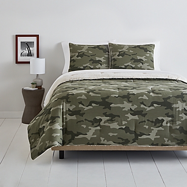 Simply Essential&trade; Camo Sherpa 2-Piece Reversible Twin/Twin XL Comforter Set in Green. View a larger version of this product image.