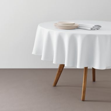 Simply Essential&trade; Essentials 70-Inch Round Tablecloth in White. View a larger version of this product image.