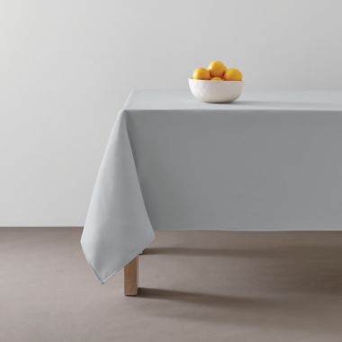 Simply Essential&trade; Essentials 52-Inch x 70-Inch Oblong Tablecloth in Grey. View a larger version of this product image.
