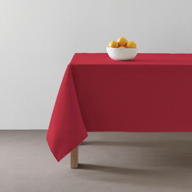 Simply Essential&trade; Essentials 52-Inch x 70-Inch Oblong Tablecloth in Red. View a larger version of this product image.