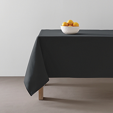 Simply Essential&trade; Essentials 60-Inch x 84-Inch Oblong Tablecloth in Black. View a larger version of this product image.