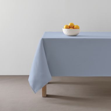 Simply Essential&trade; Essentials 52-Inch x 70-Inch Oblong Tablecloth in Blue. View a larger version of this product image.