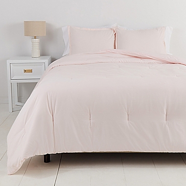 Simply Essential&trade; Garment Washed Solid 3-Piece King Comforter Set in Rosewater. View a larger version of this product image.