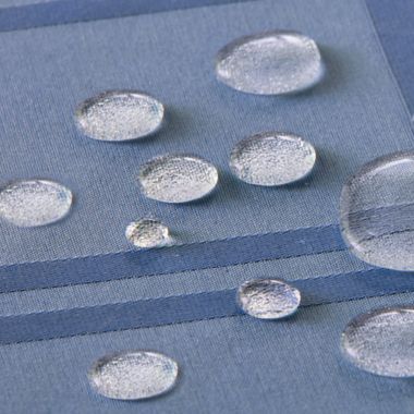 Simply Essential&trade; Solid Windowpane 52-Inch Square Tablecloth in Blue. View a larger version of this product image.