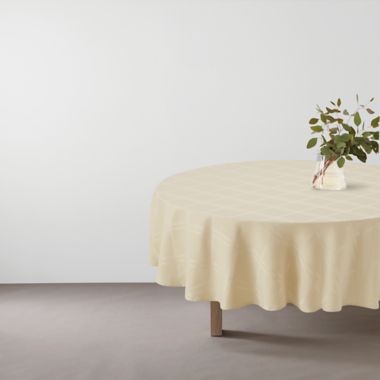 Simply Essential&trade; Solid Windowpane 70-Inch Round Tablecloth in Sand. View a larger version of this product image.