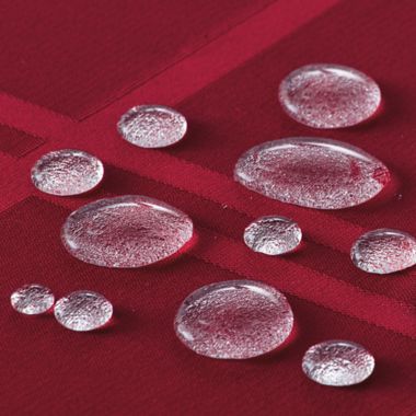 Simply Essential&trade; Solid Windowpane 52-Inch x 70-Inch Oblong Tablecloth in Red. View a larger version of this product image.