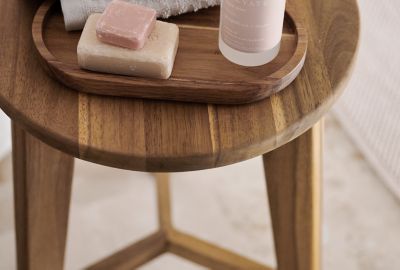 Warm wood furnishings evoke a sophisticated, timeless vibe.