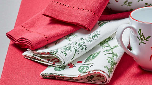 Tablecloths, runners & more for a holly jolly table.