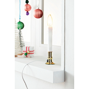 H for Happy&trade; Electric Incandescent Candle Lamp with Sensor in Brass. View a larger version of this product image.