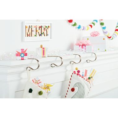 H for Happy&trade; Mantel Christmas Stocking Hooks in Bronze (Set of 4). View a larger version of this product image.