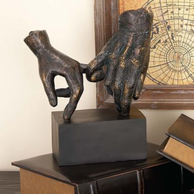 Ridge Road D&eacute;cor Holding Hands Sculpture. View a larger version of this product image.