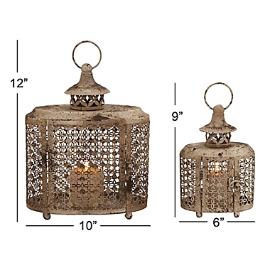 Ridge Road D&eacute;cor 2-Piece Oval Scallop Lattice Iron Candle Lantern Set in Beige. View a larger version of this product image.