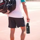 Alternate image 4 for Takeya&reg; Actives 32 oz. Insulated Stainless Steel Water Bottle with Spout Lid in Onyx