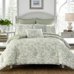 But with its cushioned headboard and soft green upholstery, it's luxe enough too. green and white bedding sets bed bath