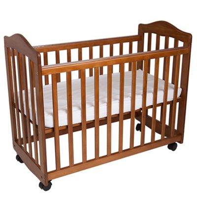 brown mini crib