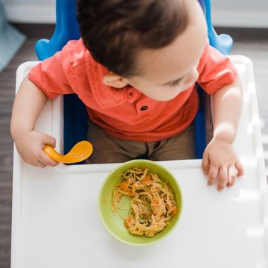 Kizingo Left-Handed Toddler Spoon in Blue. View a larger version of this product image.