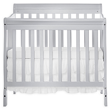 Dream On Me Aden 3-in-1 Convertible Mini Crib in Grey. View a larger version of this product image.