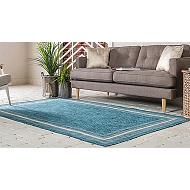 Unique Loom Soft Border Outdoor 4&#39; x 6&#39; Powerloomed Indoor/Outdoor Area Rug in Teal. View a larger version of this product image.