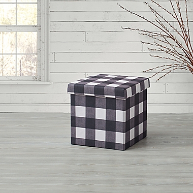 Bee &amp; Willow&trade; Linen Upholstered Plaid Ottoman in Black. View a larger version of this product image.