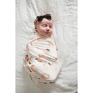 Copper Pearl&trade; Caroline Peach Swaddle Blanket in Orange/White. View a larger version of this product image.