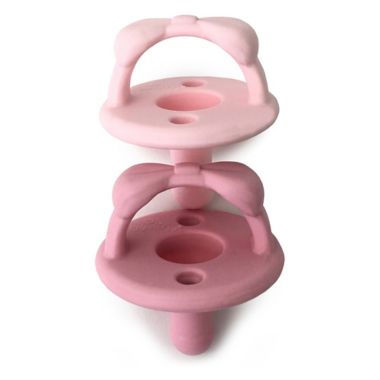 Itzy Ritzy&reg; Sweetie Soother&trade; 2-Pack Silicone Pacifier in Pink Bow. View a larger version of this product image.