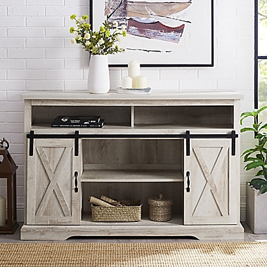 Forest Gate Wheatland 52-Inch Farmhouse Sliding Door TV Stand in Rustic Oak in White Oak. View a larger version of this product image.